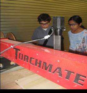 student-manufacturers-with-cnc-torchmate-wood-router-cnc